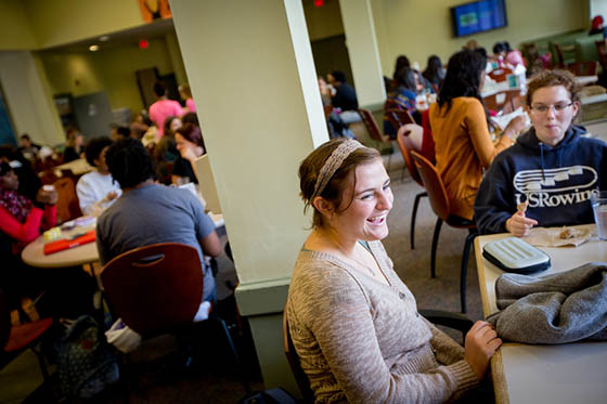 Photo of students laughing at a table in Anderson Dining Hall