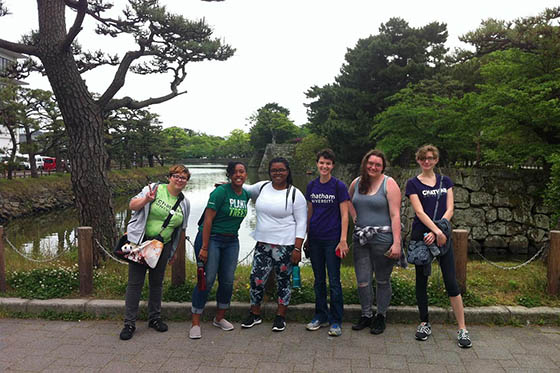 Photo of a group of Chatham students posing at Wakayama Castle