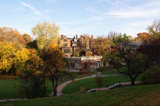 Rolling grassy hills, historic red brick buildings, and multicolored autumn trees decorate Chatham University's Shadyside campus in Pittsburgh.