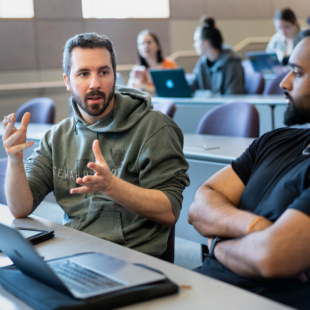 Chatham communication students working in a lecture hall