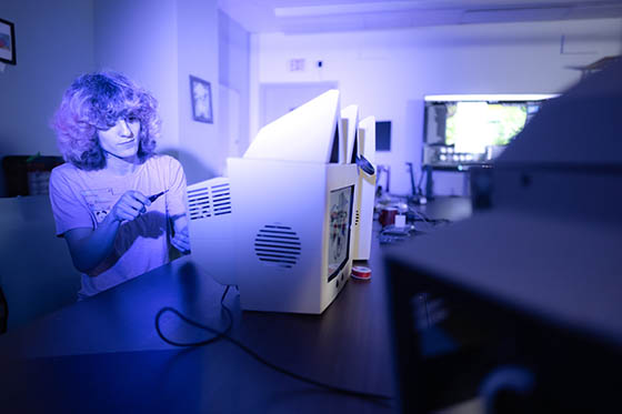 Immersive Media bachelor students works on computer in studio
