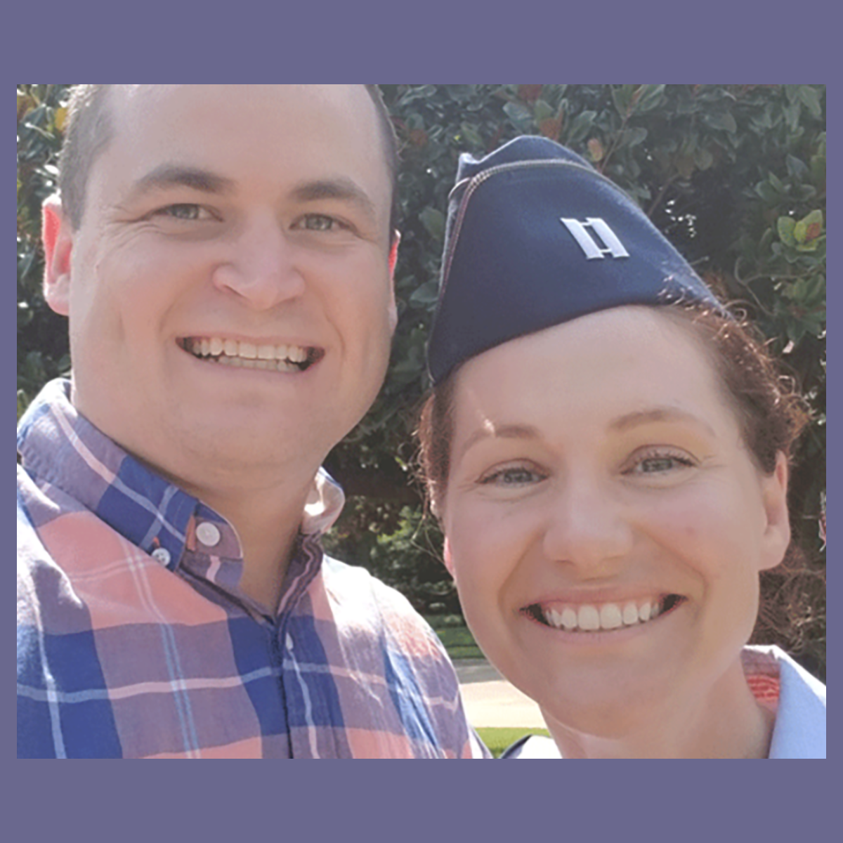 Photo of a man and a woman, both veterans with one in uniform, smiling for a selfie together