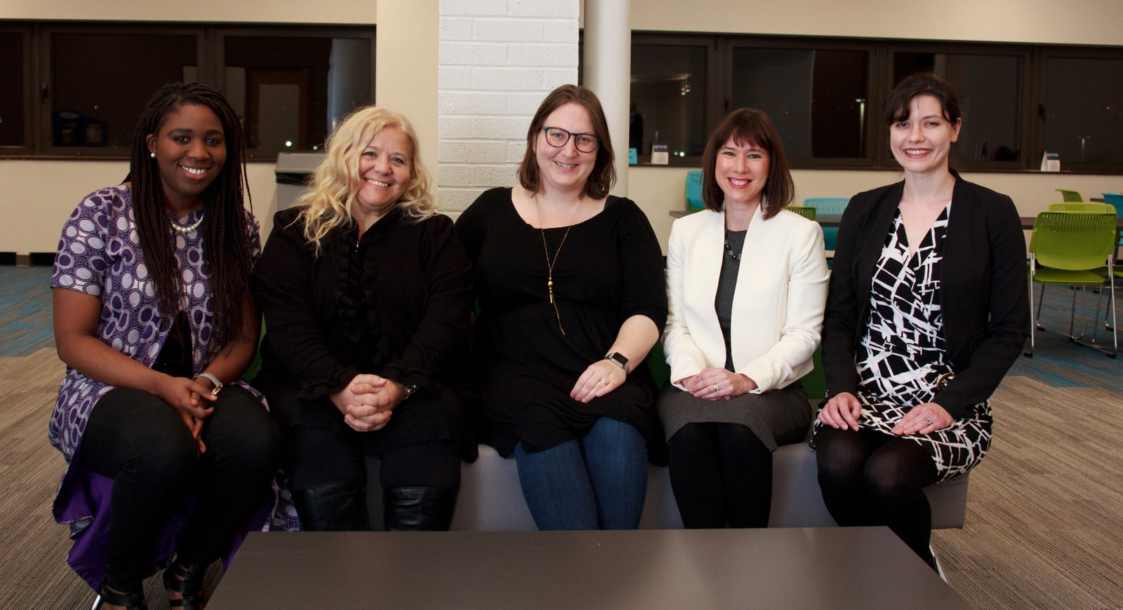 Photo of five smiling women seated in Chatham's Center for Women's Entrepreneurship