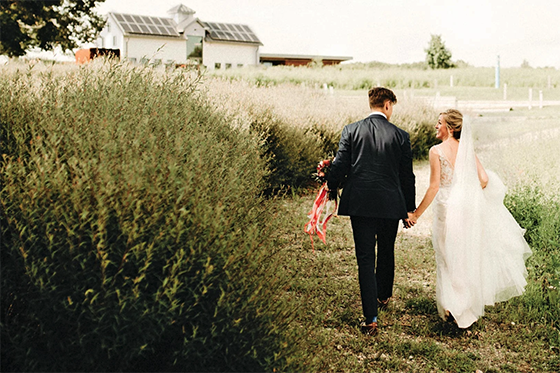 Bride and groom posing together on their wedding day at Eden Hall