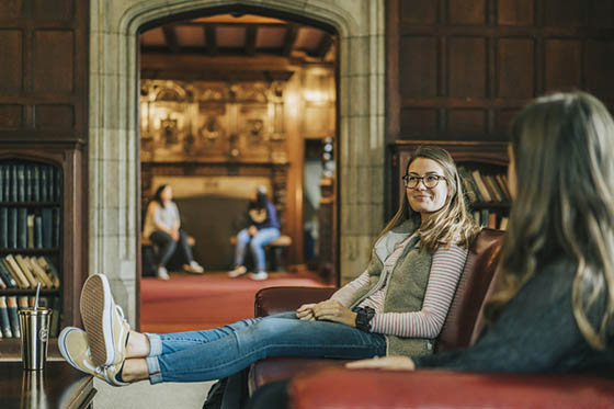 Photo of Chatham University students hanging out in a lounge