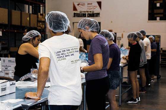 Photo of Chatham University students volunteering at a food bank