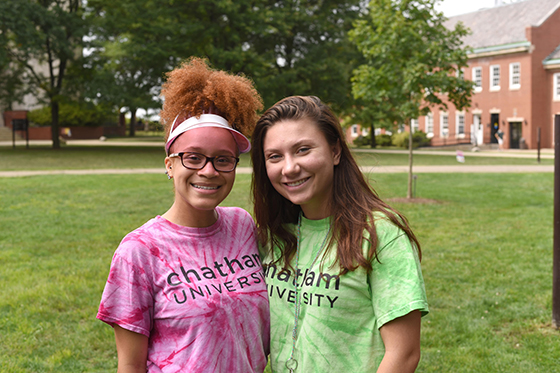 Photo of two female Chatham University students side by side, smiling