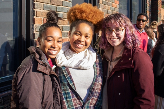 Photo of three Chatham University students smiling