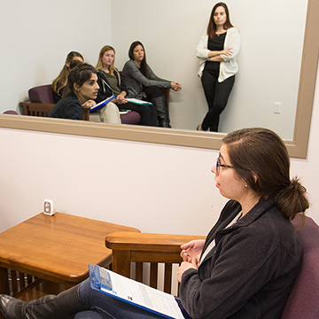 Two counseling psychology graduate students working together